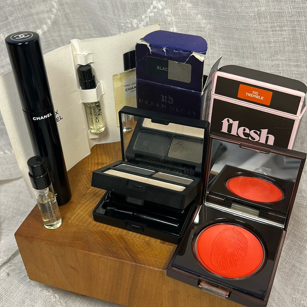 Chanel mascara, Chanel two perfume minies, Urban Decay brow box, and Flesh lip